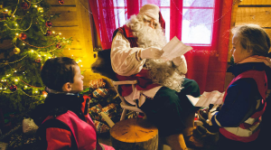 Santa's Lapland: Santa reading Christmas wish lists